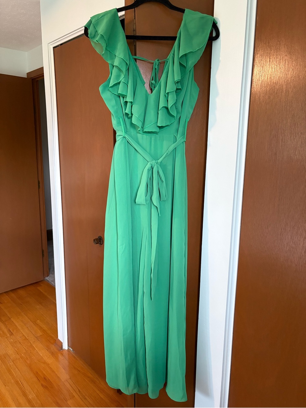Impressions Boutique Green Ruffle V-Neck Jumpsuit with Tie Waist
